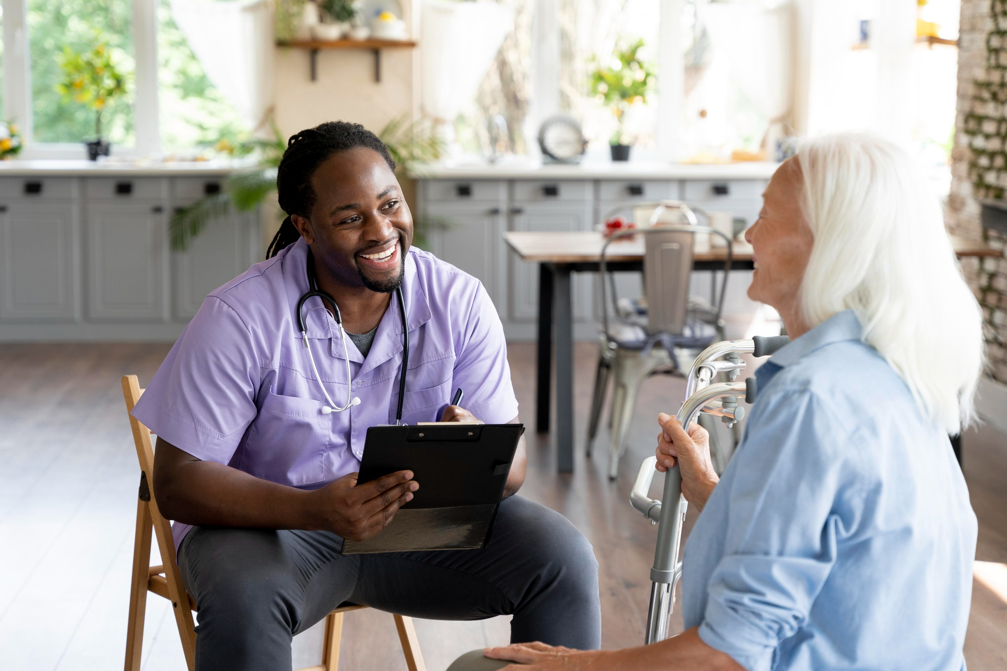 Professional caregiver supporting a senior client at home in McKinney
