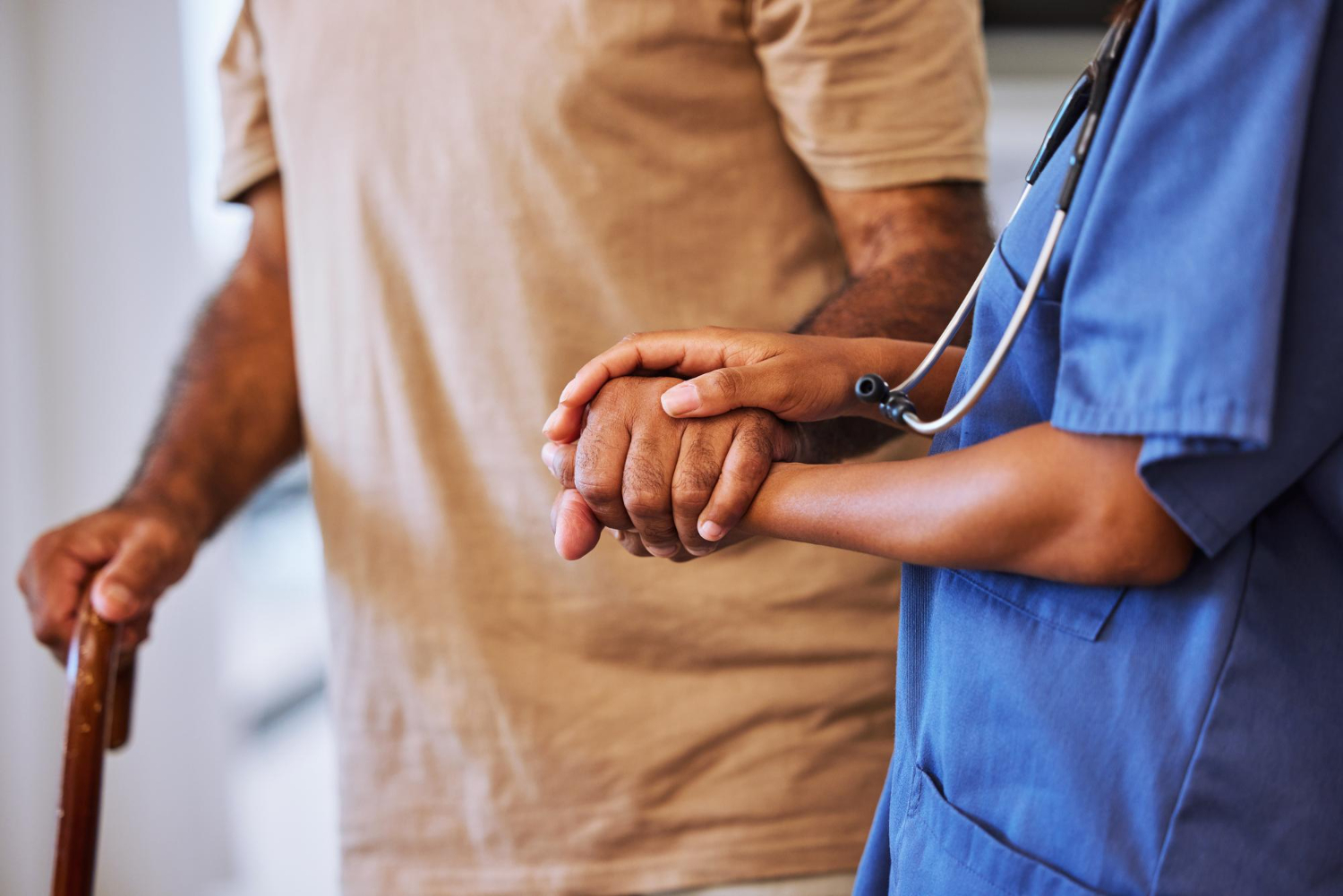 Supportive hands representing compassionate senior care